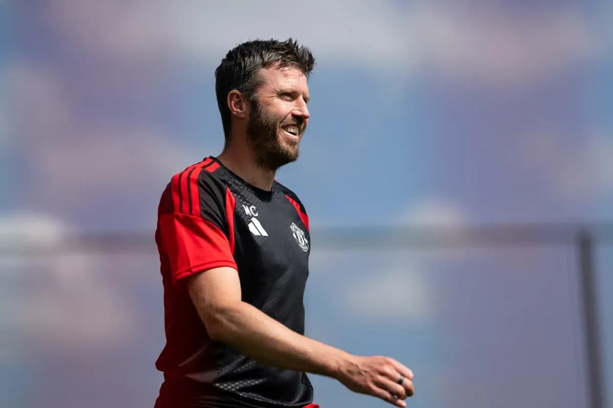 Coach walking during training session in sunny weather