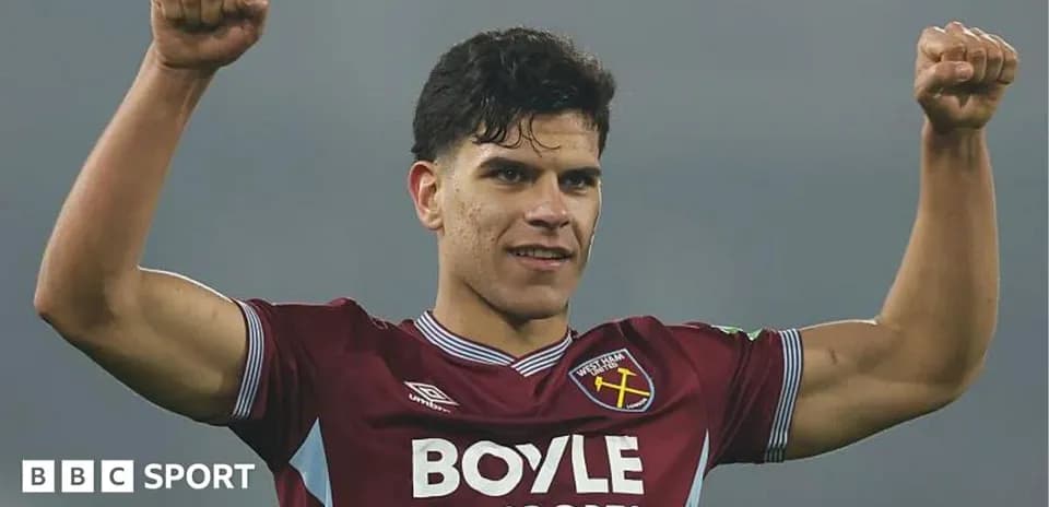 Player celebrating victory in West Ham jersey