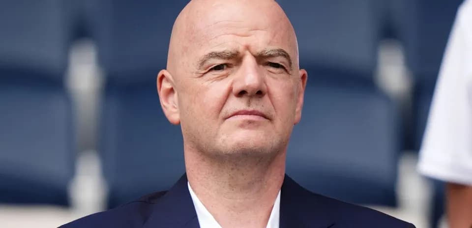 FIFA president seated at an event