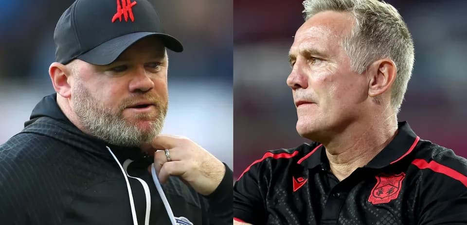Two football managers during a match day interaction