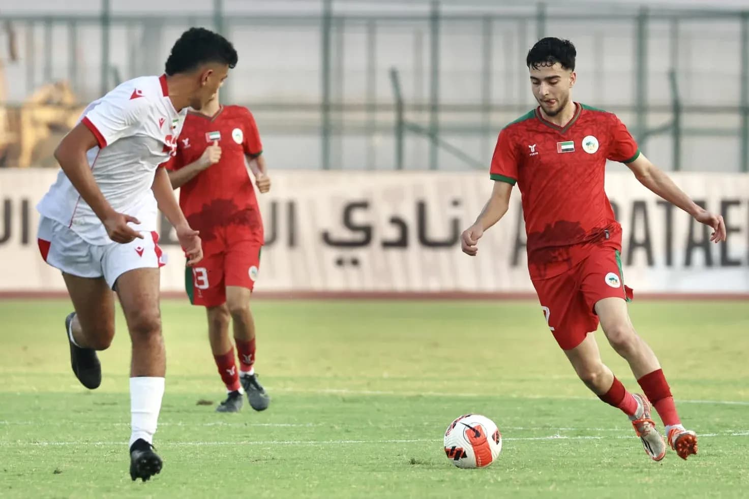 Al Sharjah U23 player dribbling the ball