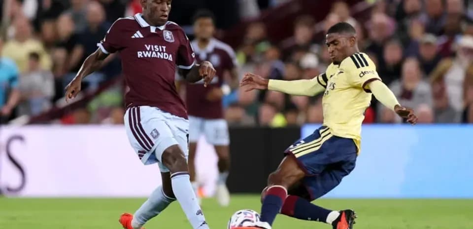 Two players contesting the ball during match