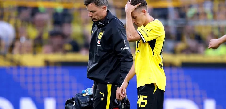 Player receiving medical attention after injury on field