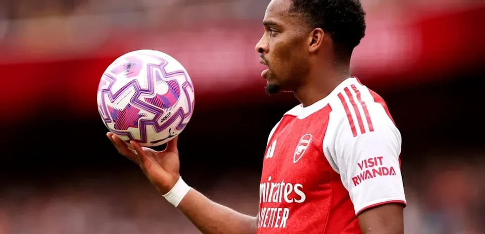 Player holding ball during match at stadium