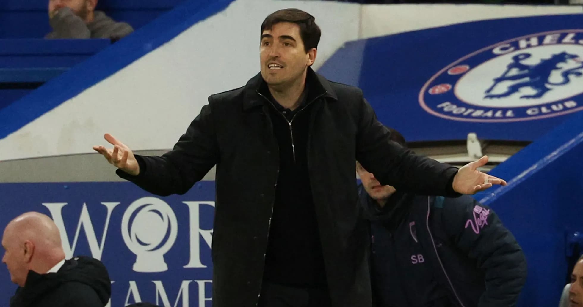 Coach gesturing during match on the sidelines