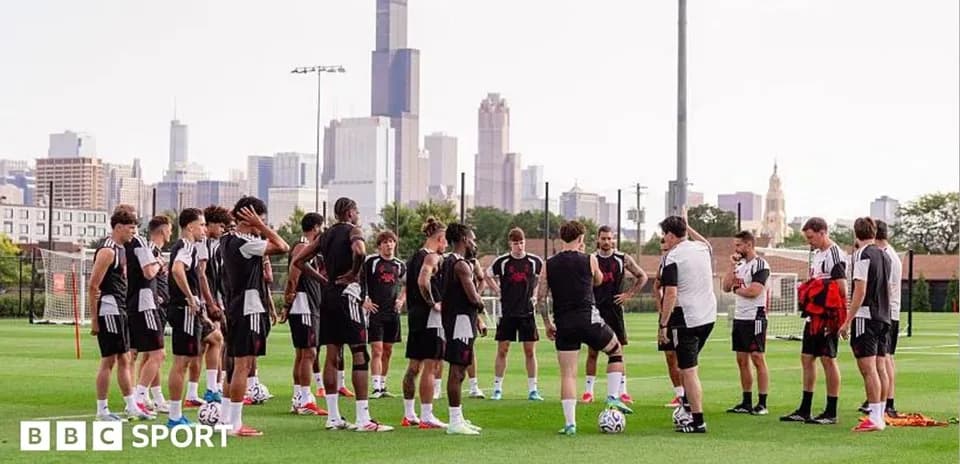 Soccer team in training session with skyline backdrop