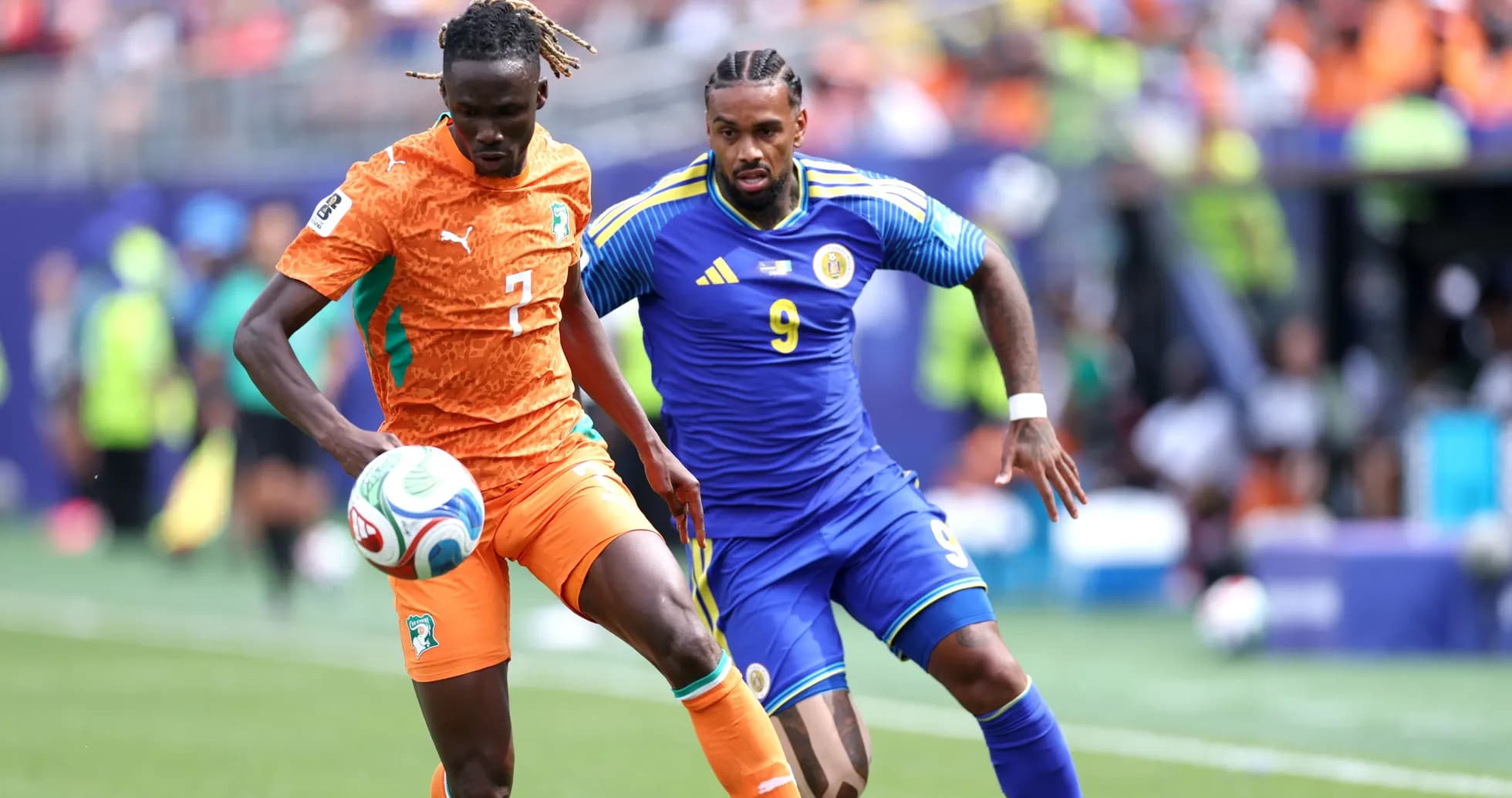 Two players competing for the ball during match