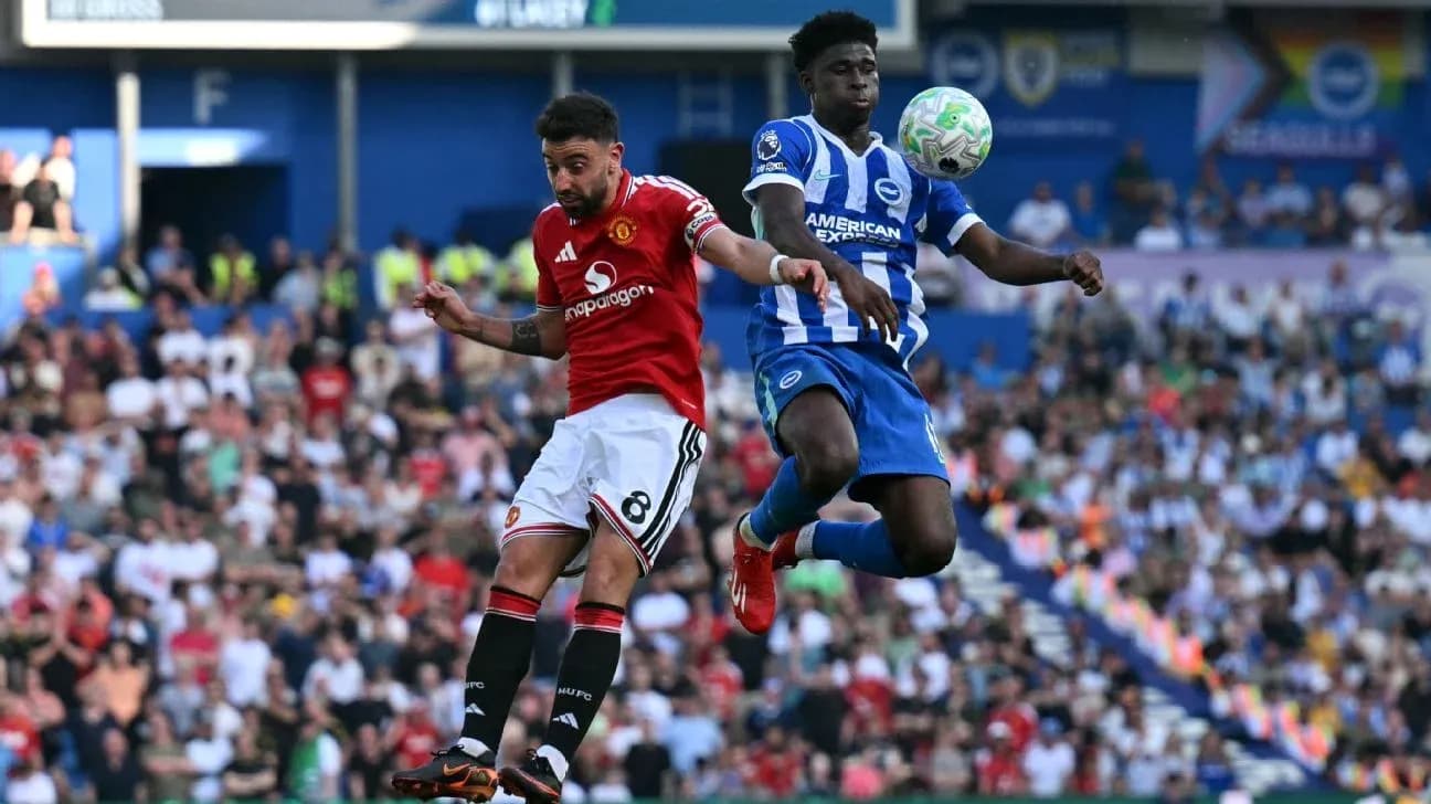 Player heading the ball during a football match