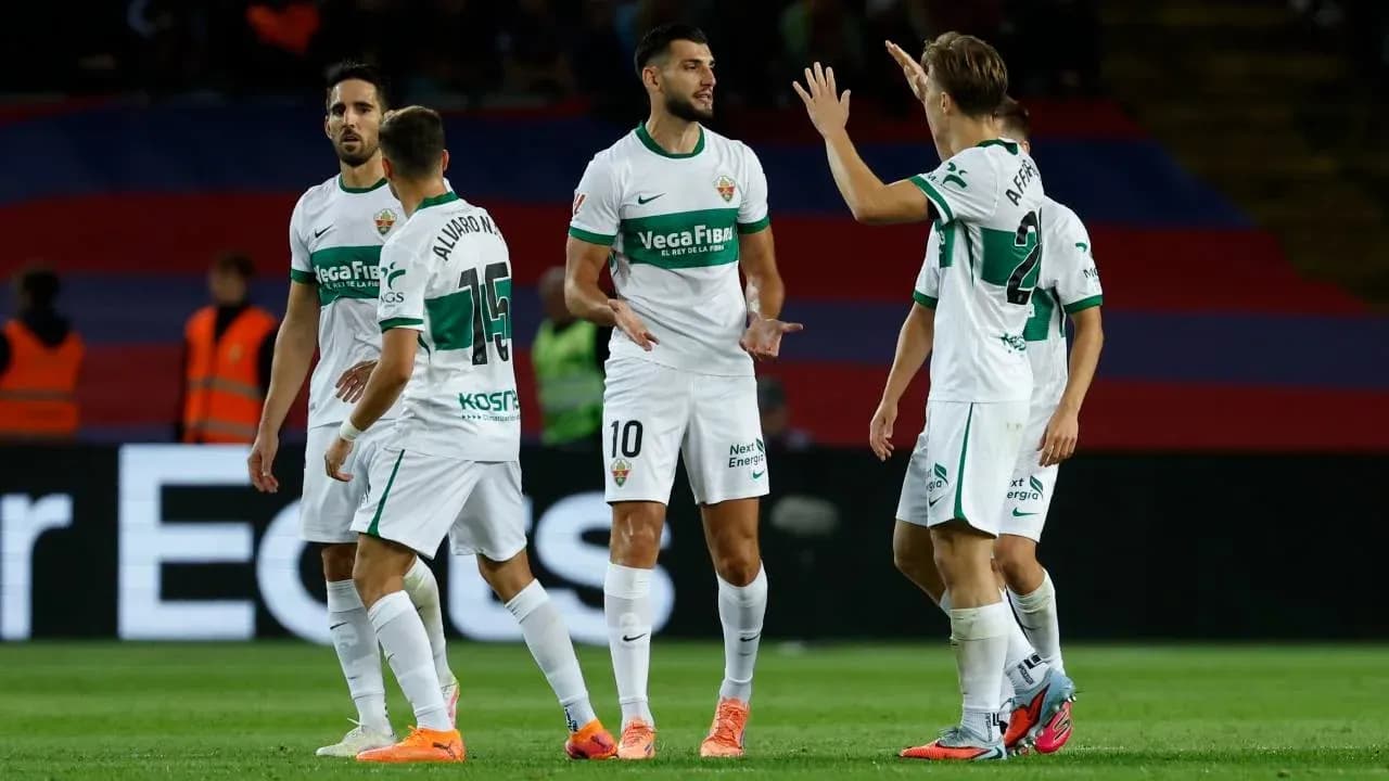 Elche players celebrating during La Liga match