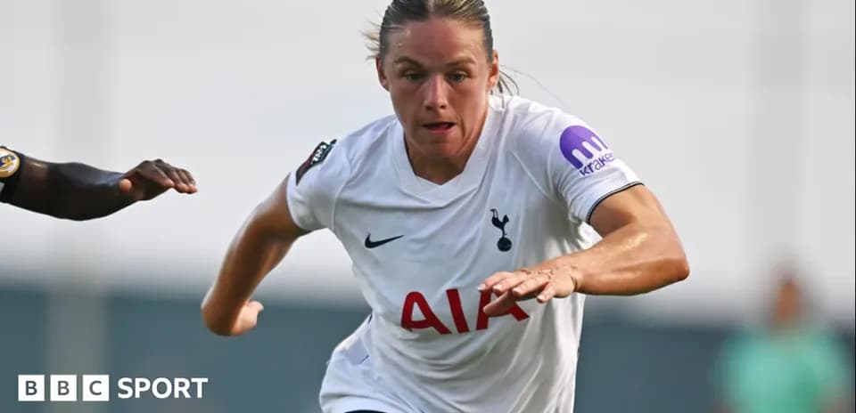Player sprinting with ball during match action