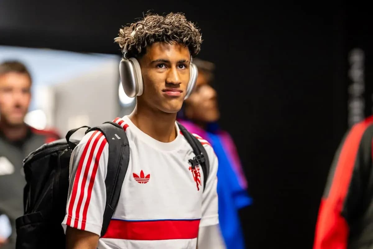 Player wearing headphones entering the stadium