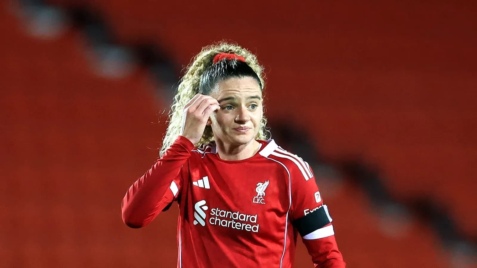 Player in red Liverpool kit during a match