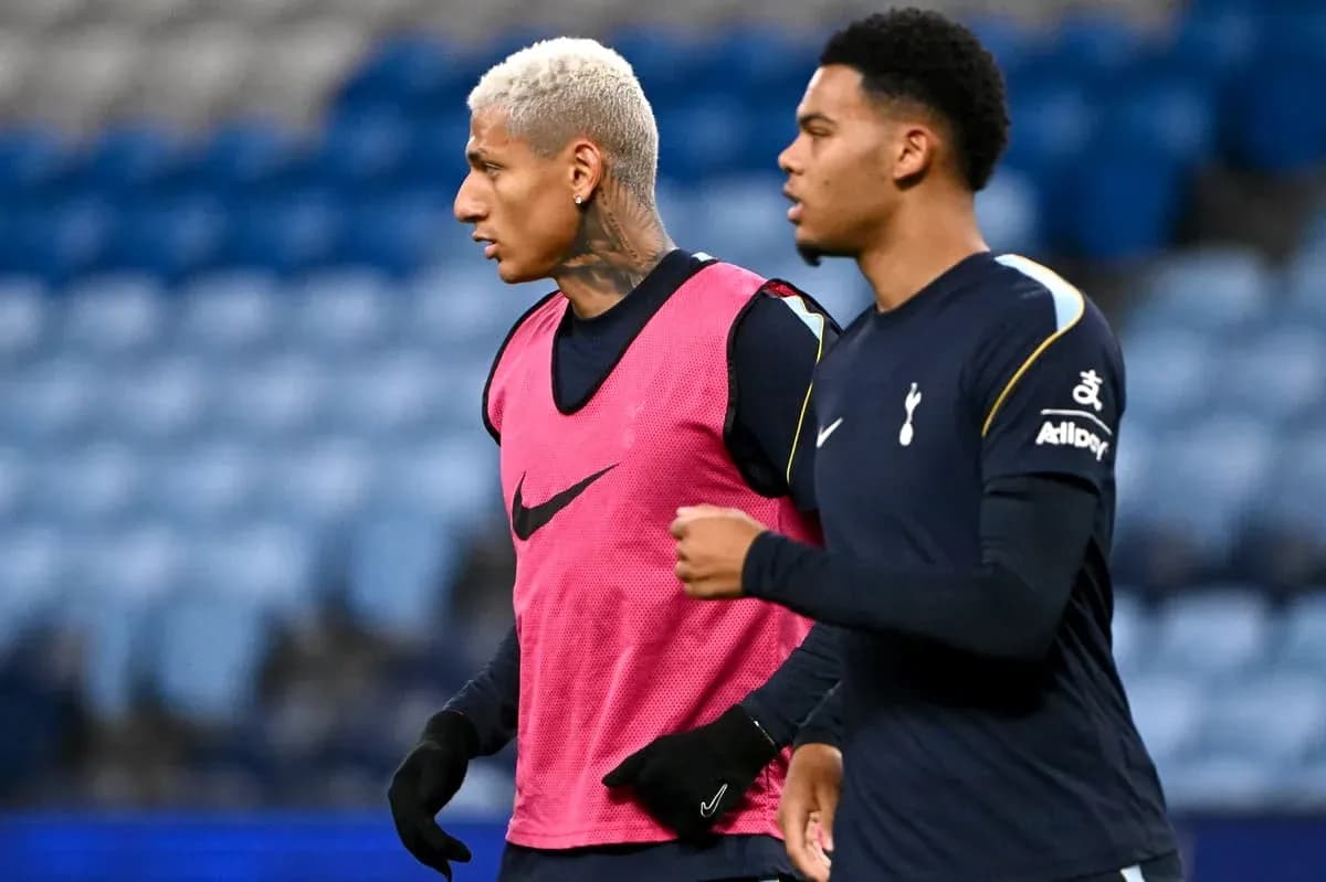 Two Tottenham players warming up before a match