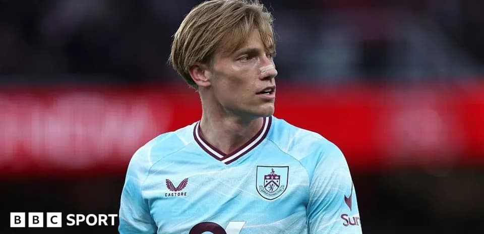 Player wearing Burnley kit during match