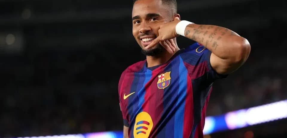 Player celebrating goal with phone gesture