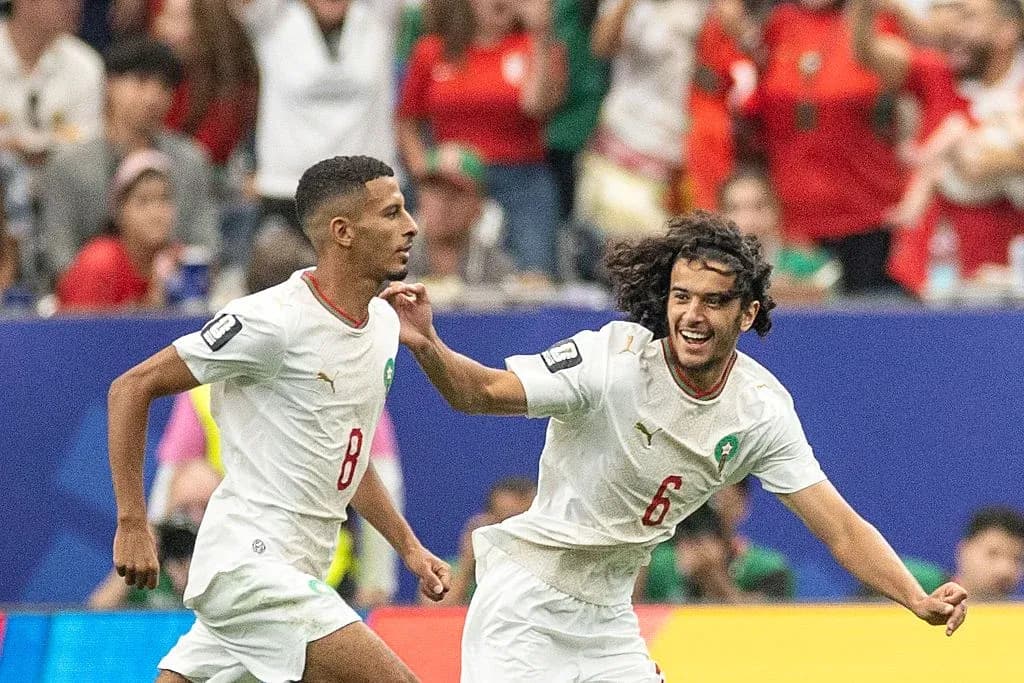 Moroccan players celebrating a goal during match