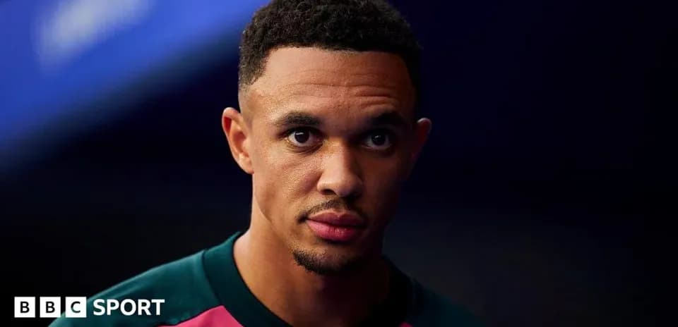 Player in team jersey looking directly at camera