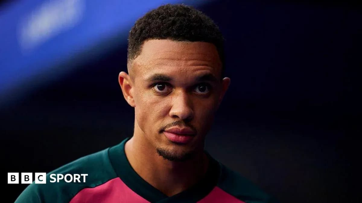 Player in team jersey looking directly at camera