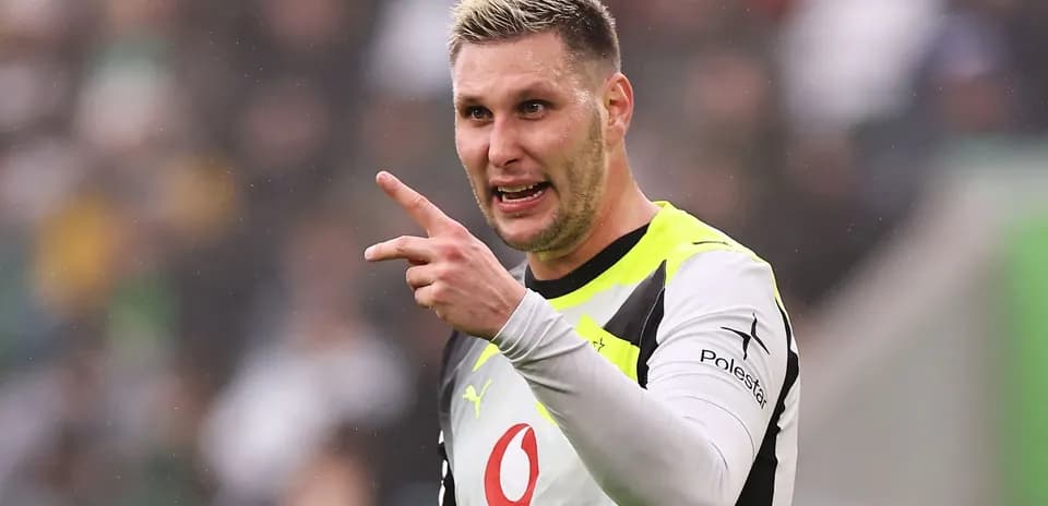 Goalkeeper gesturing during a match on field