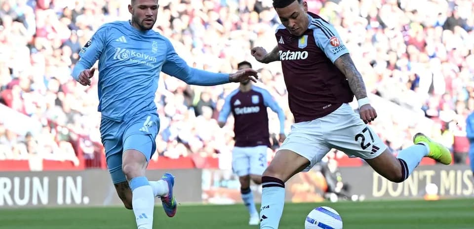 Nottingham Forest player challenging Aston Villa player
