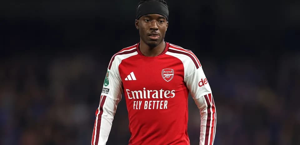Player wearing Arsenal jersey during a match