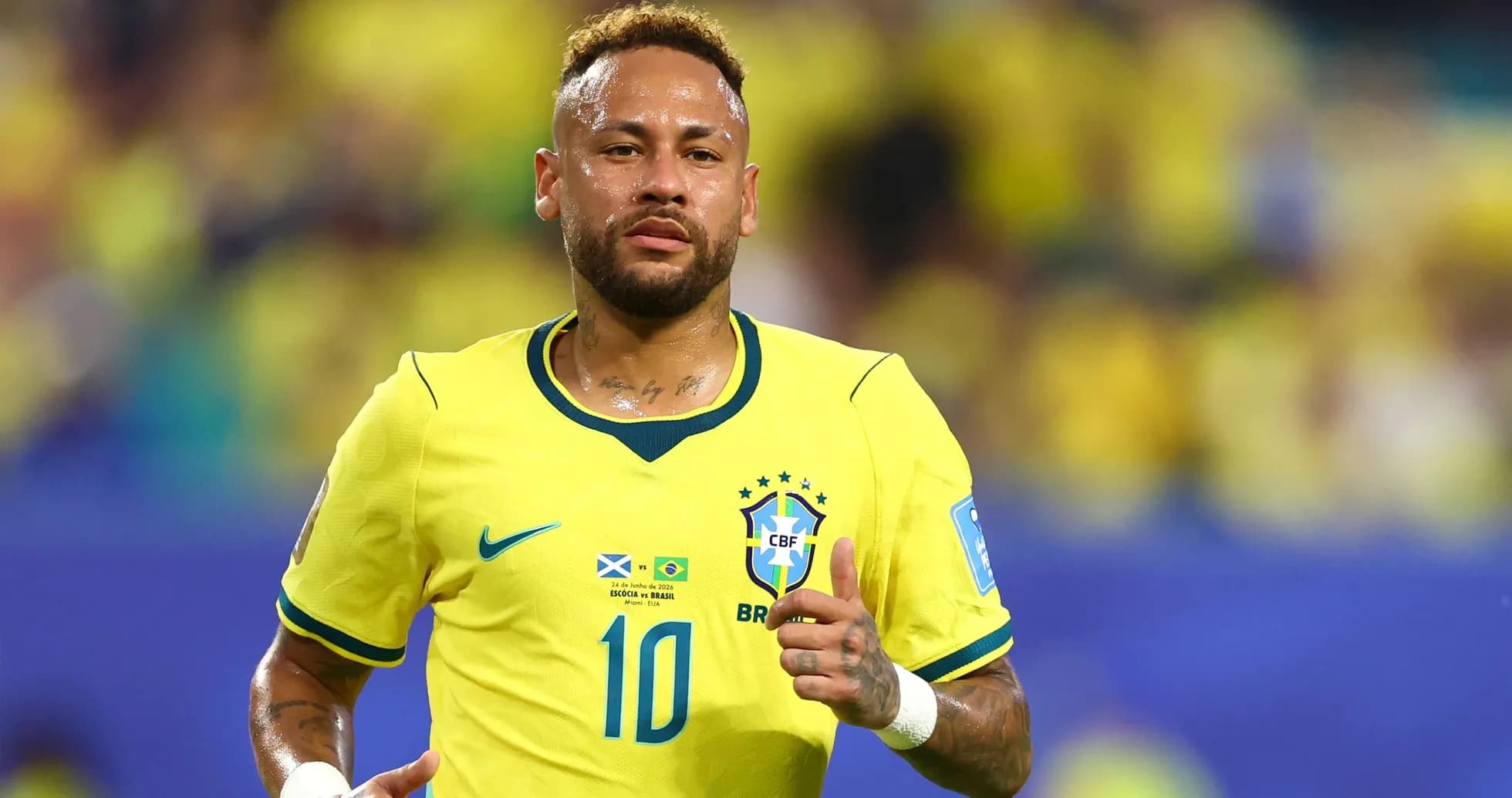Neymar running on the field in Brazil jersey