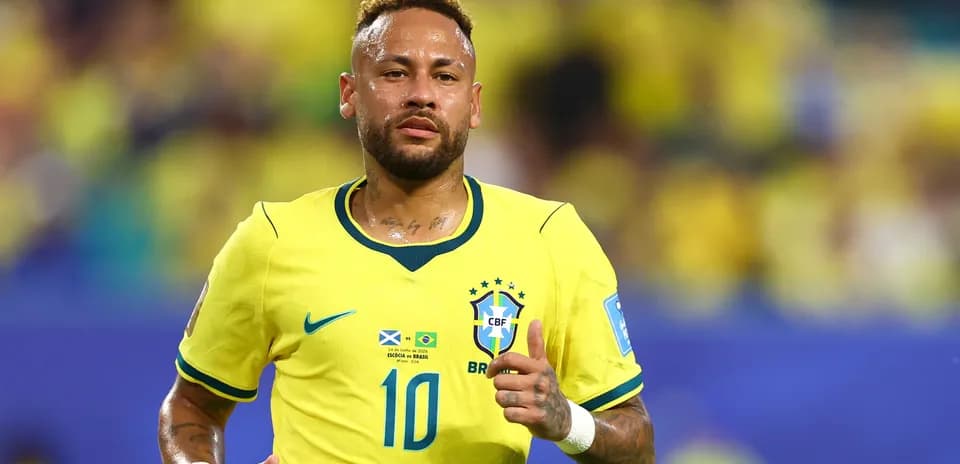 Neymar running on the field in Brazil jersey