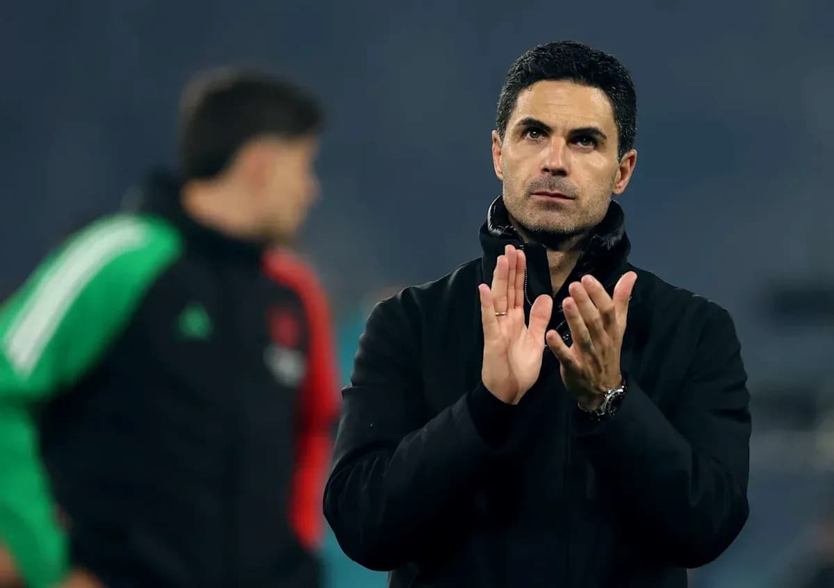 Coach applauding during training session