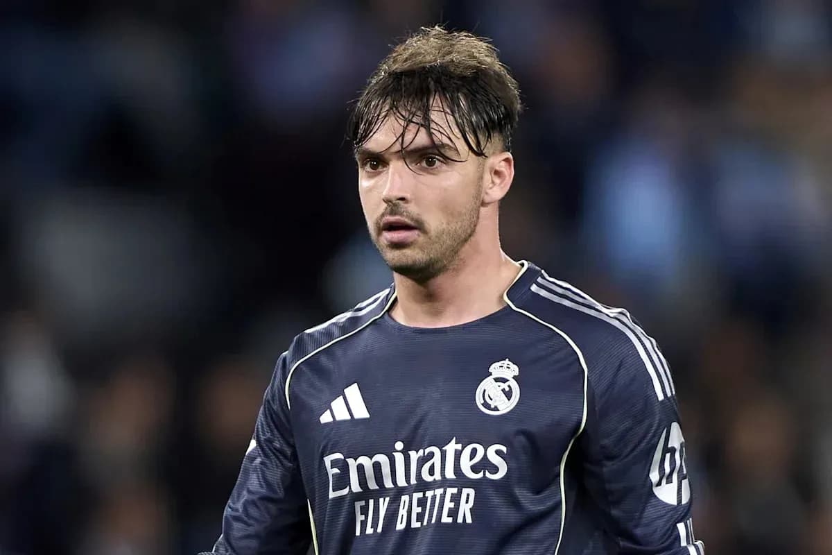 Player in Real Madrid goalkeeper jersey on field
