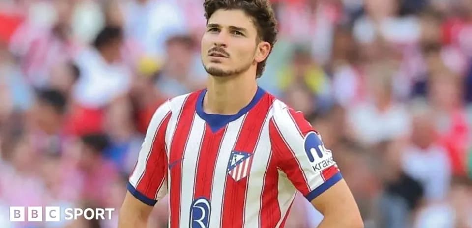 Atletico Madrid player looking up during match