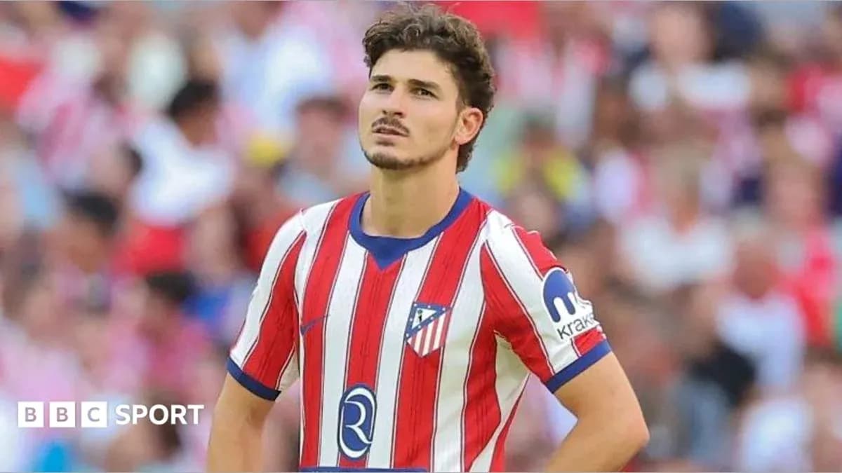 Atletico Madrid player looking up during match