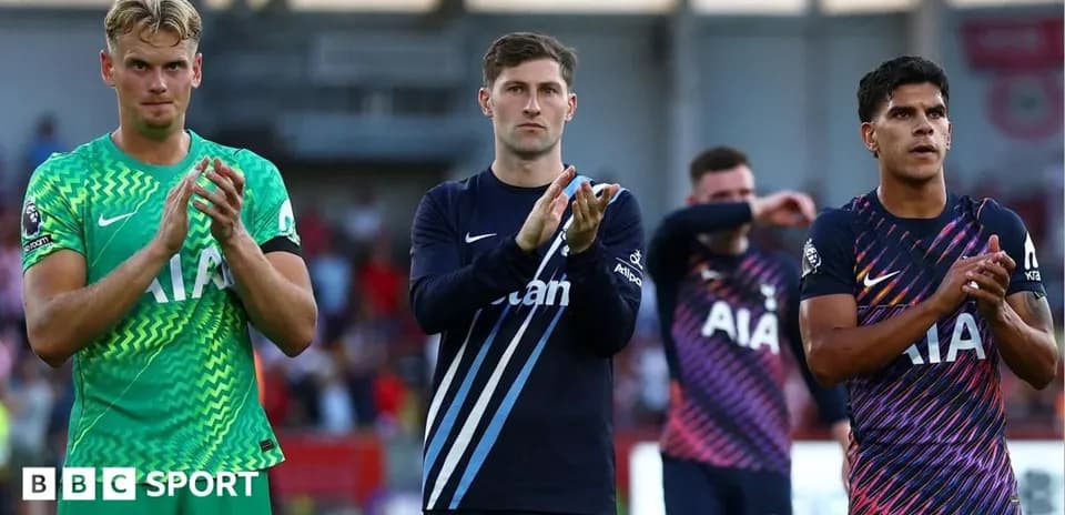 Three players applauding fans after a match