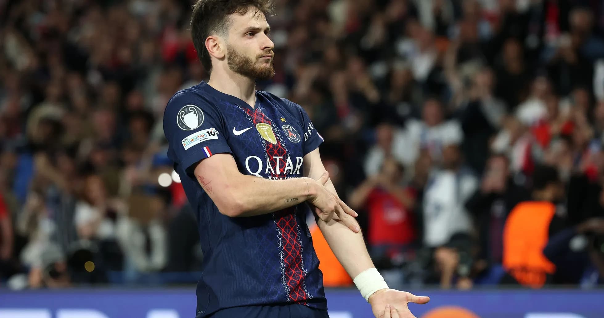 Player gesturing during a match at stadium