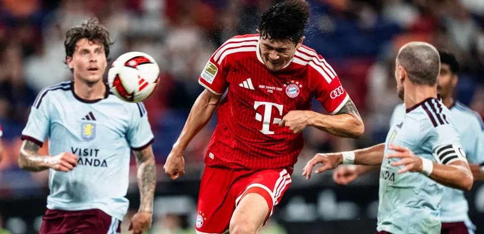 Player heading the ball during a match