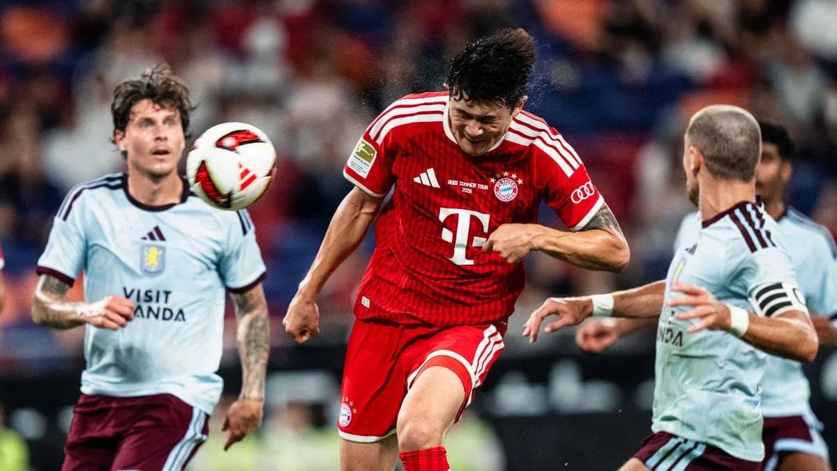 Player heading the ball during a match