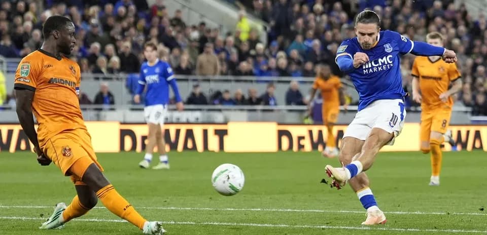 Player kicking the ball during a football match