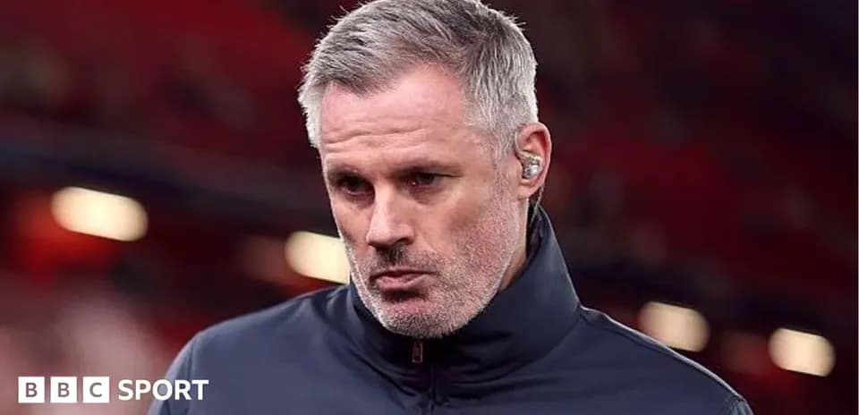 Man wearing a dark jacket in stadium setting