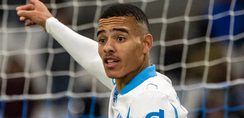 Player celebrating a goal on the field