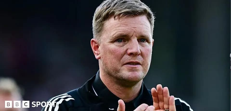 Manager clapping during a match on the sideline