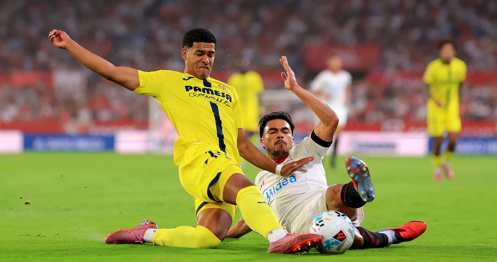 Players contesting the ball during Villarreal vs Sevilla