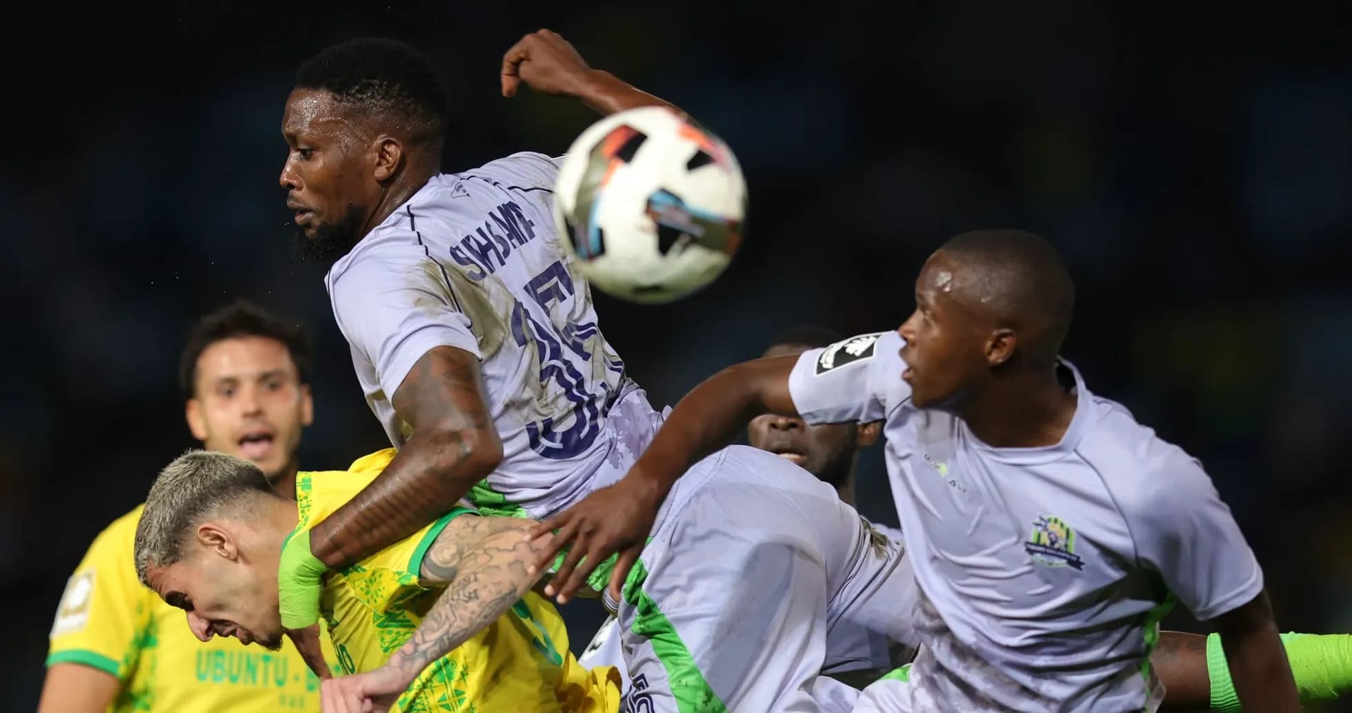 Players contesting for the ball during a match