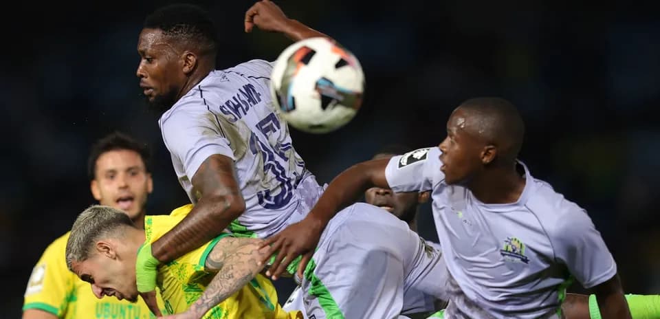 Players contesting for the ball during a match