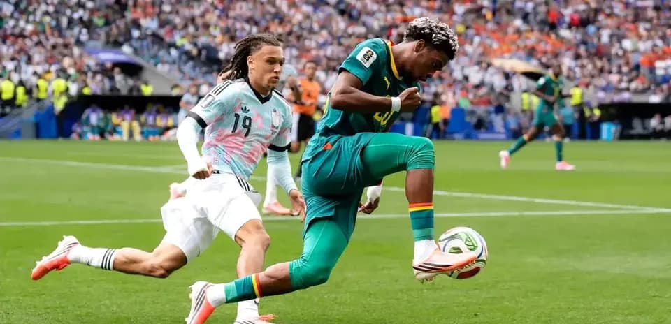 Player dribbling the ball during competitive match