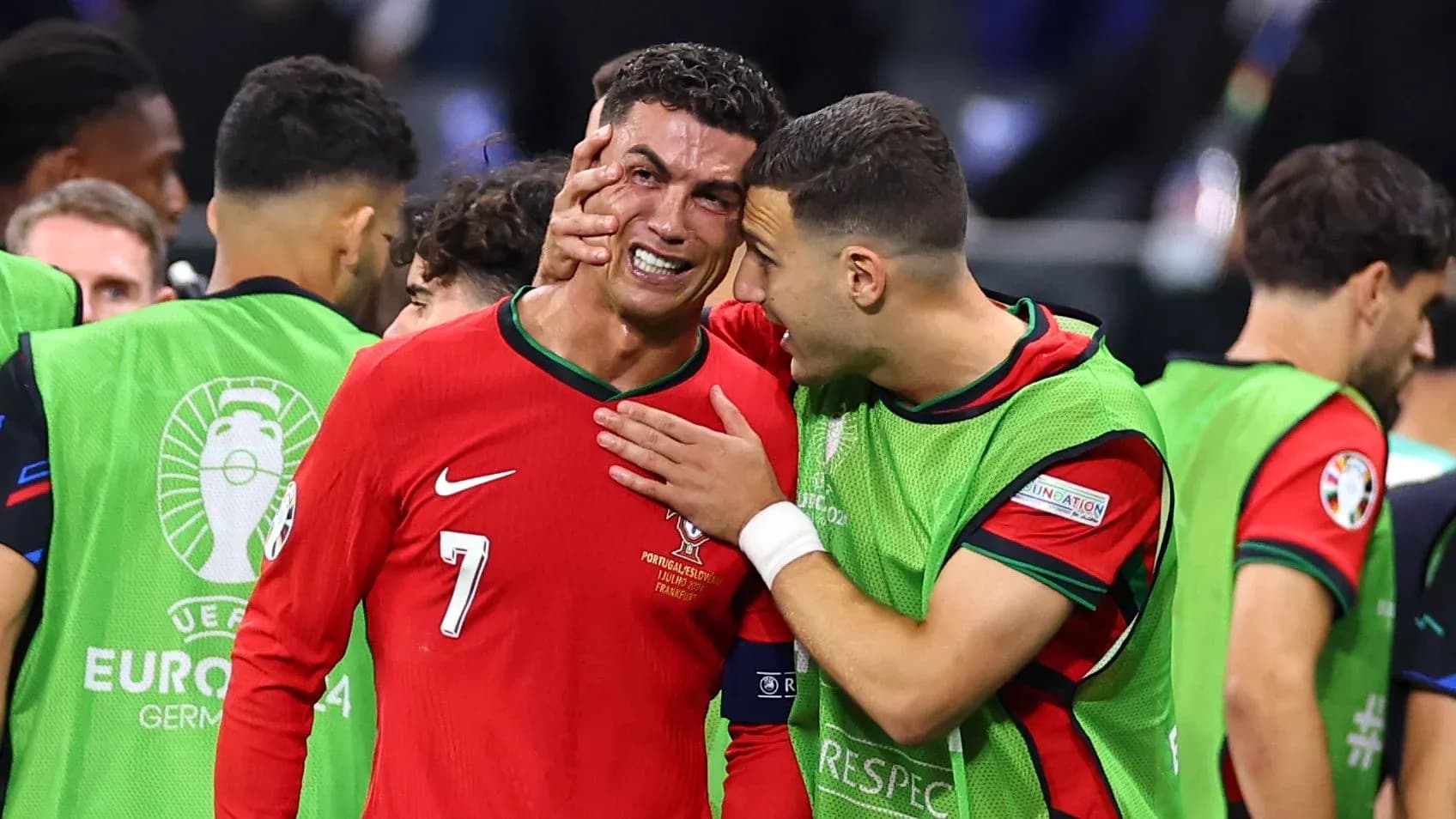 Cristiano Ronaldo and teammate celebrating after match