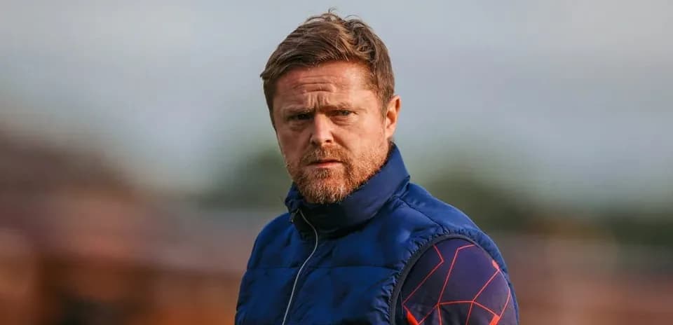 Coach observing during training session outdoors