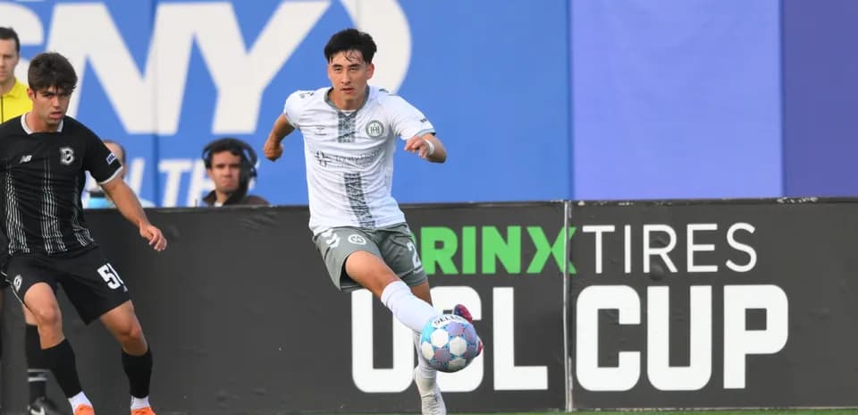 Player dribbling during NY Cosmos vs Hartford match