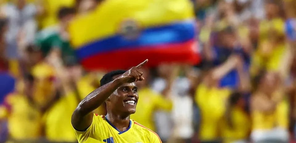 Player celebrating with fans during a match