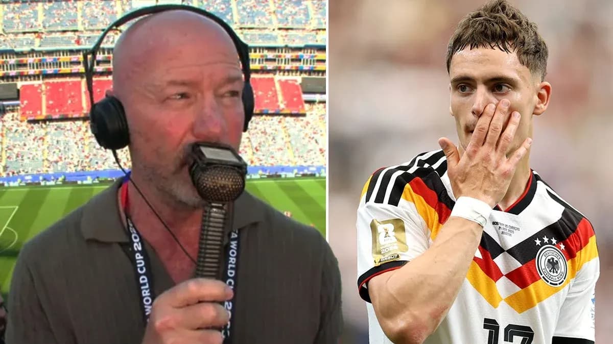 Sports commentator speaking into microphone, player in Germany jersey