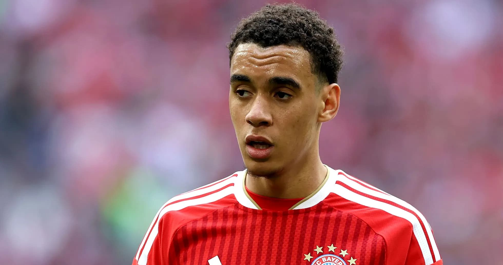 Player wearing Bayern Munich jersey on the field