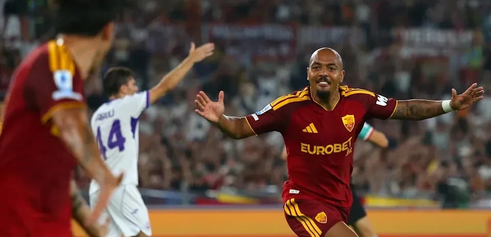 Player celebrating goal during match in stadium